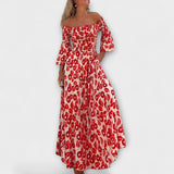 Bella - Vestido con hombros descubiertos y flores del océano