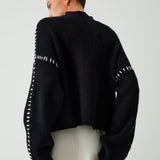 Alma | Suéter oversize de cuello alto en piqué con detalles