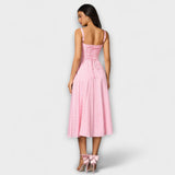 Upanje - vestido rosa con detalle de abertura